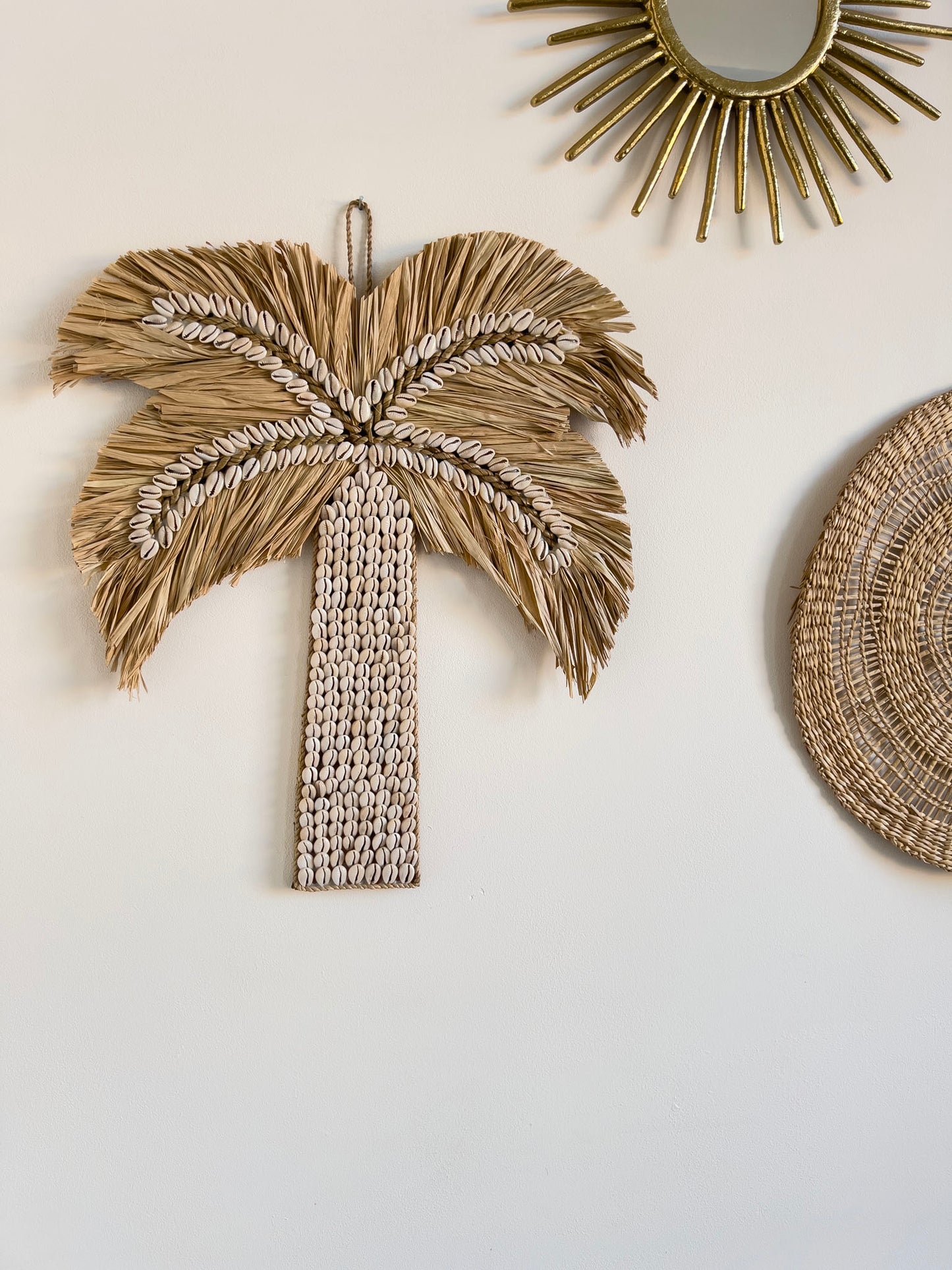Palm raffia met Kaurischelpen